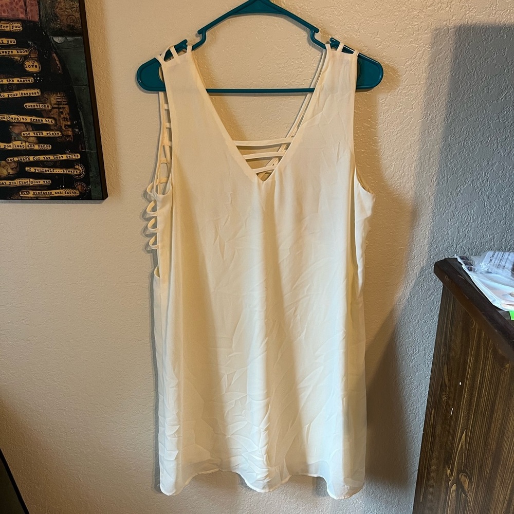 Double line off white mini dress.